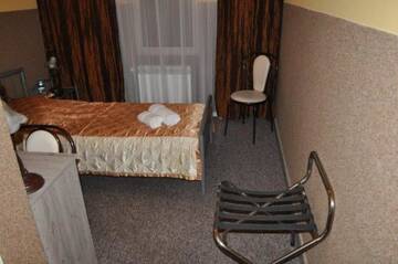 Фото номера Одноместный номер с ванной комнатой Отель Hotel u Liska г. Кутно 4