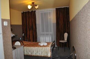 Фото номера Одноместный номер с ванной комнатой Отель Hotel u Liska г. Кутно 12