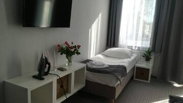 Фото номера Трехместный номер Отель Hotel Inner City г. Кутно 3